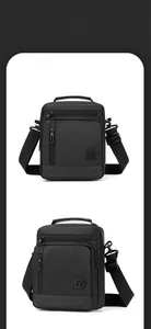 Macro shot of durable black nylon men shoulder bag showing zippers and textures