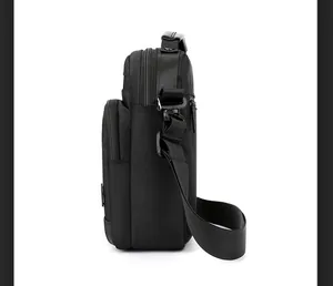 Side view of waterproof messenger bag featuring multiple zippers and reinforced handle