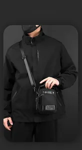 Waterproof tactical crossbody bag for men in matte black nylon with multi-pocket design