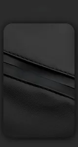 Detail of waterproof matte fabric with We Power text and smart storage on black chest bag