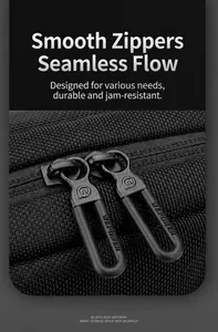 Close-up of durable matte black metal dual zippers with engraved logo on nylon chest bag