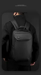 Detail of matte waterproof business backpack with smooth zipper and circular brand logo