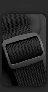 Close-up of durable nylon shoulder strap and high-quality adjustment buckle on a black chest bag