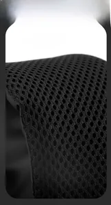 Close-up of breathable honeycomb mesh fabric on the back of a black men's chest bag