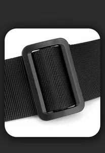 Detail of adjustable black shoulder strap buckle on water-resistant business bag
