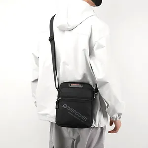 Men's minimalist black nylon crossbody bag with WEPOWER logo and adjustable strap