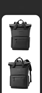 Détails d'un sac à dos noir étanche avec fermeture à enroulement et poignées tissées