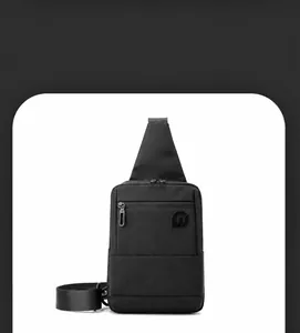 Close-up of black high-density fabric chest bag featuring a durable zipper pocket