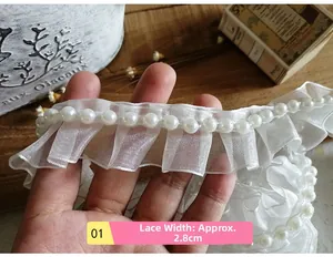 Close-up of 2.8cm white organza pleated lace trim with faux pearl beads for DIY sewing