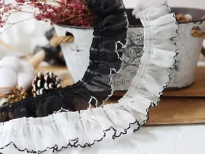 Detail of 4cm pleated chiffon lace trim with contrast stitching for DIY crafts