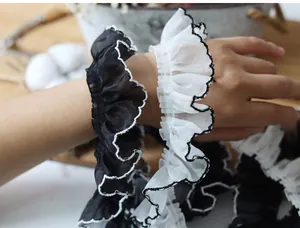 Detail of 4cm pleated lace ruffle hair scrunchies with contrast stitch edging and volume