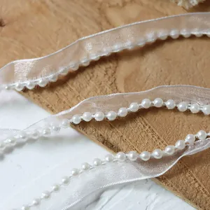 Elegant white chiffon ribbon with pearl beads for garment decoration and DIY crafts