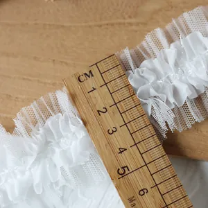 White double-layered pleated mesh lace trim with floral details measuring 5cm width