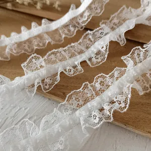 White ruffled lace trim with elastic stretch for Lolita clothing and DIY sewing crafts