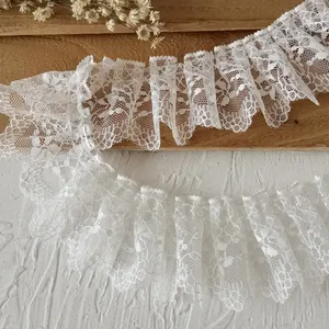 White ruffled lace trim with floral embroidery for DIY doll clothes and sewing accessories