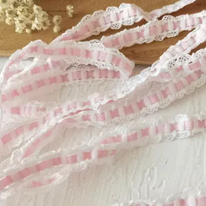 Pink and white elastic lace ribbon with wavy edges for DIY sewing and gift wrapping
