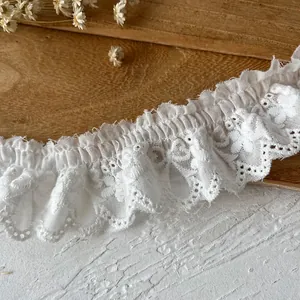White embroidered cotton lace trim with pleated ruffle edge for DIY sewing projects