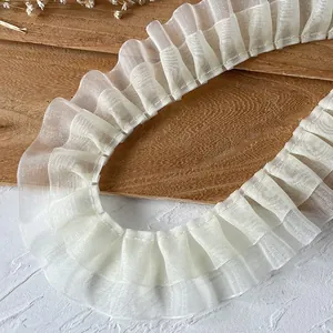 Elegant ivory ruffled lace trim with pleated organza layers for DIY dress decoration