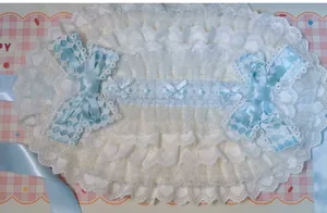 Detalle de encaje de corazones con lazos de satén azul para accesorios de estilo Lolita
