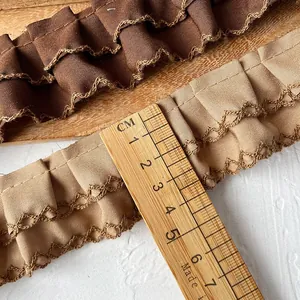 Brown and khaki ruffled lace trim ribbon with scalloped edges for DIY sewing crafts