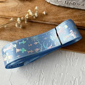 Blue holographic gothic ribbon with silver crosses and spider webs for DIY crafts