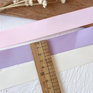 2.5cm matte satin ribbons in pink, purple, and cream for DIY bows and crafts