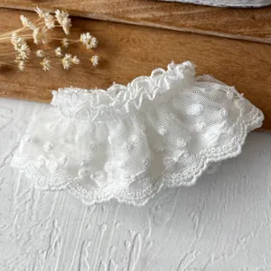 Elegant white pleated lace collar with polka dot embroidery and scalloped mesh edges