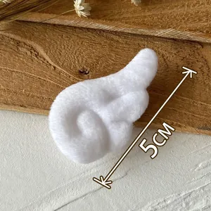 5cm white plush devil wings for DIY lolita crafts and accessories on wood surface