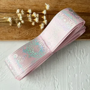 Detailed view of pink holographic magic circle ribbon for DIY handmade crafting