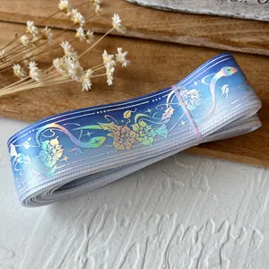 Blauwe gradiënt lint met laser slang en bloem patroon voor DIY ambacht decoratie