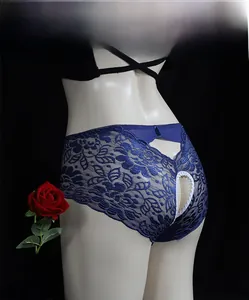 Detail of dark blue lace open crotch panties with floral embroidery and back bow