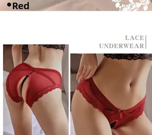 Detailed view of red lace crotchless panties with bow detail and cross-straps design