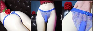 Detail of men's blue floral lace thong with embroidered pouch and elastic waistband