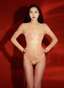 Detailed view of flesh-colored seamless sheer bodysuit with breathable mesh fabric
