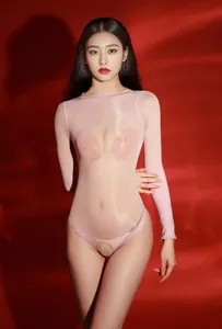 Detail of pink sheer seamless bodysuit with long sleeves and crotchless design