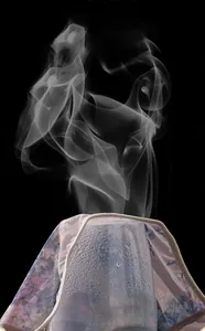 Detail of floral mesh fabric showing high breathability with steam passing through