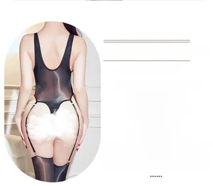 Detail of glossy black sheer bodysuit with high cut sides and garter belt attachment