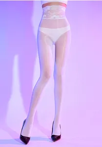 Detailed view of high waist white oil shiny stockings with wide lace floral waistband