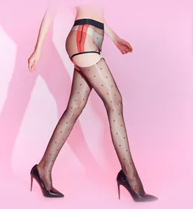 Detail of sheer black tights featuring small red hearts and a mock garter belt suspender look