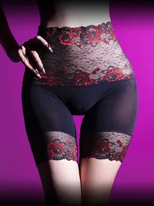 Macro view of high waist lace shapewear briefs featuring red floral embroidery details