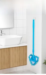 Space-saving hanging triangle mop with microfiber cloth on a white bathroom wall hook