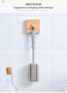Detail of grey long-handle bottle brush showing the hanging hook for storage on wall