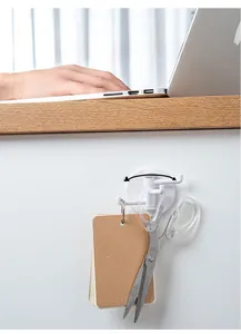 Wall-mounted white swivel hook with 180-degree rotation showing multi-functional storage