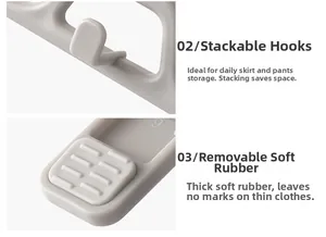 Detail of stackable hooks and non-marking soft rubber pads on plastic pants hangers