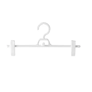 White plastic multi-functional non-slip pant hanger with adjustable clips for home storage
