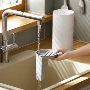 Multifunctional grey kitchen knife holder with drainage tray under running water
