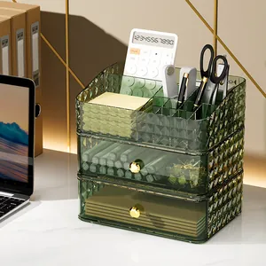 Green acrylic organizer with diamond texture, open top compartments and gold handle drawers