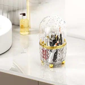 Rotating dustproof makeup brush holder with transparent lid and gold diamond base