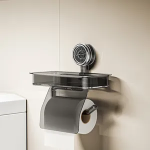 Wall-mounted smoky grey translucent paper towel holder with storage tray and suction cup