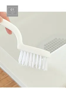 Detail view of the V-type cleaning brush head showing the dense stiff bristles for gaps